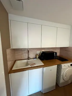 Cuisine ou kitchenette dans l'établissement Studio centre village