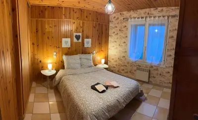 Un ou plusieurs lits dans un hébergement de l'établissement La maison de Lydie