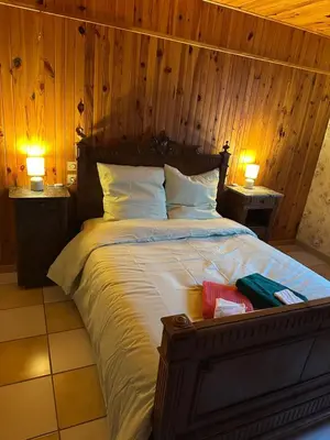 Un ou plusieurs lits dans un hébergement de l'établissement La maison de Lydie