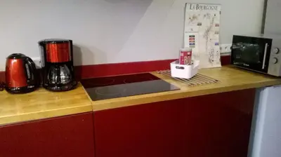 Cuisine ou kitchenette dans l'établissement Appartements Caractere Clos St Jean
