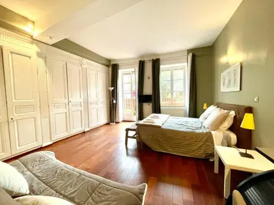 Un ou plusieurs lits dans un hébergement de l'établissement Appartements Caractere Clos St Jean