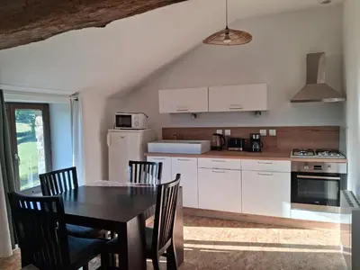 Cuisine ou kitchenette dans l'établissement Les Gîtes de Sophinette