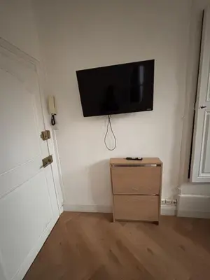 Télévision ou salle de divertissement dans l'établissement Le Cocon Dijonnais - Cours Cambronne