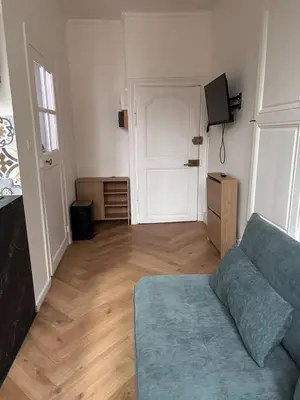 Télévision ou salle de divertissement dans l'établissement Le Cocon Dijonnais - Cours Cambronne