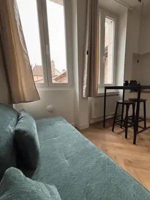 Coin salon dans l'établissement Le Cocon Dijonnais - Cours Cambronne