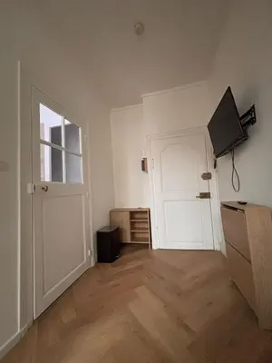 Télévision ou salle de divertissement dans l'établissement Le Cocon Dijonnais - Cours Cambronne