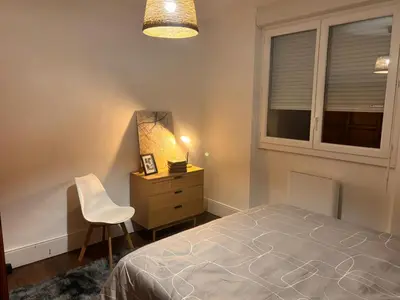 Un ou plusieurs lits dans un hébergement de l'établissement Refuge Éclatant Paray 4 couchages
