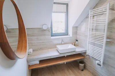Salle de bains dans l'établissement Maison et Appartement jusqu'à 24 personnes