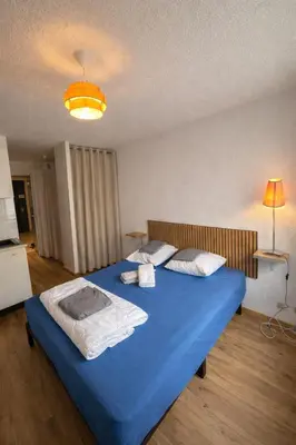 Un ou plusieurs lits dans un hébergement de l'établissement Logis, appartement, 220 élégant et central