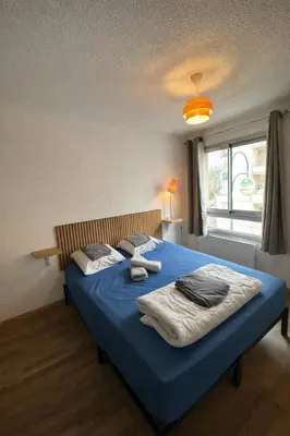 Un ou plusieurs lits dans un hébergement de l'établissement Logis, appartement, 220 élégant et central