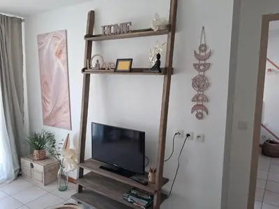Télévision ou salle de divertissement dans l'établissement welcome toEspace Zen