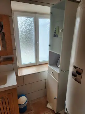 Salle de bains dans l'établissement La maison bleue