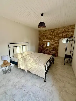 Un ou plusieurs lits dans un hébergement de l'établissement Gîte 2 suites proche du lac de Chalain