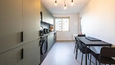 Cuisine ou kitchenette dans l'établissement Rhapsodie