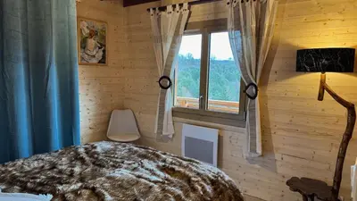 Un ou plusieurs lits dans un hébergement de l'établissement Le Chalet du Silence