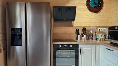 Cuisine ou kitchenette dans l'établissement Le Chalet du Silence