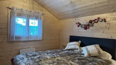 Un ou plusieurs lits dans un hébergement de l'établissement Le Chalet du Silence