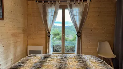 Un ou plusieurs lits dans un hébergement de l'établissement Le Chalet du Silence