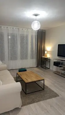 Télévision ou salle de divertissement dans l'établissement Bel Appartement-T3 Lumineux