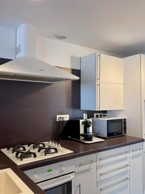 Cuisine ou kitchenette dans l'établissement Maison de caractère au cœur du village