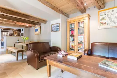 Coin salon dans l'établissement Le P'tit Clos