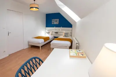 Un ou plusieurs lits dans un hébergement de l'établissement Le Doubs Dole - Maison 73m2 - proximité ciné & voie verte - au calme