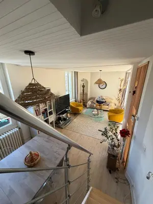 Coin salon dans l'établissement Grand Duplex spacieux en maison de ville
