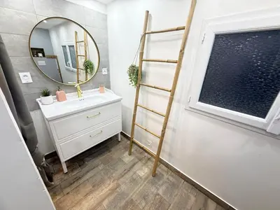 Salle de bains dans l'établissement Appartement Cosy terrasse
