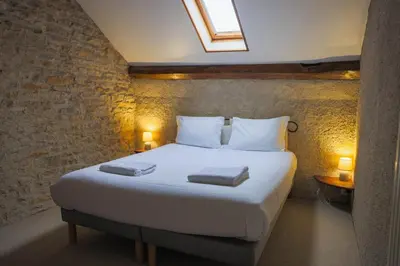 Un ou plusieurs lits dans un hébergement de l'établissement L'Ancien Relais