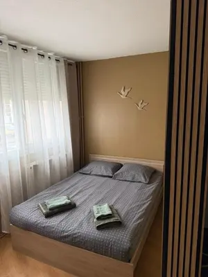 Un ou plusieurs lits dans un hébergement de l'établissement Studio - Chalon-sur-Saône
