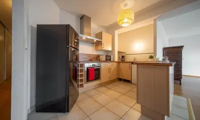Cuisine ou kitchenette dans l'établissement Grand 70m2 - Gare à pied - Fibre - Parking