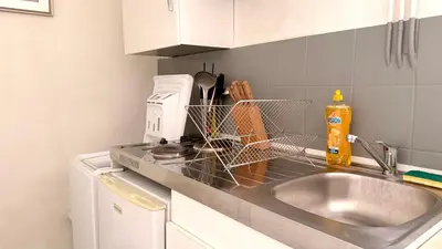 Cuisine ou kitchenette dans l'établissement Le Mars - 2 voyageurs - Republique - Central