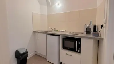 Cuisine ou kitchenette dans l'établissement Le Bel André - calme - parking gratuit