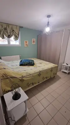 Un ou plusieurs lits dans un hébergement de l'établissement Hébergement dans le vignoble du Mâconnais
