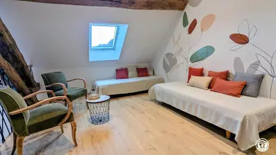 Coin salon dans l'établissement Chez le Paul Jacques