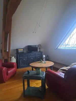 Coin salon dans l'établissement maison la Bambine chambre esprit château
