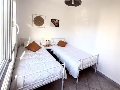 Un ou plusieurs lits dans un hébergement de l'établissement Apartment for 4 people