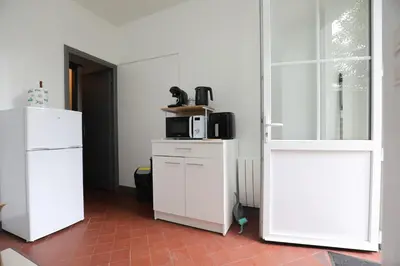 Cuisine ou kitchenette dans l'établissement Appartement Cosy - Proche du Centre-Ville
