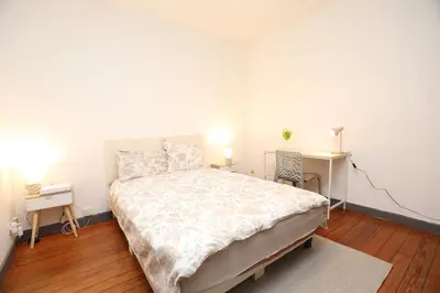 Un ou plusieurs lits dans un hébergement de l'établissement Appartement Cosy - Proche du Centre-Ville