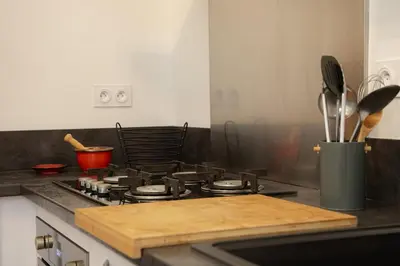 Cuisine ou kitchenette dans l'établissement Le Millésime