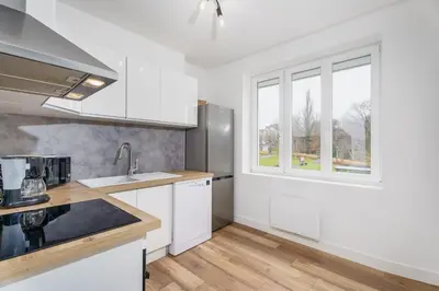 Cuisine ou kitchenette dans l'établissement Evasion Paisible - Proche parcs