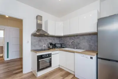 Cuisine ou kitchenette dans l'établissement Evasion Paisible - Proche parcs