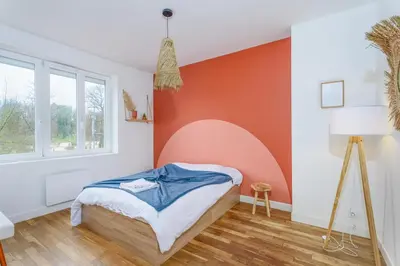 Un ou plusieurs lits dans un hébergement de l'établissement Evasion Paisible - Proche parcs