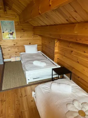 Un ou plusieurs lits dans un hébergement de l'établissement Le Nid du Lac, Chalet à côté du lac Chalain