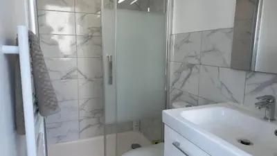 Salle de bains dans l'établissement Le Talant - Gare - 2 voyageurs