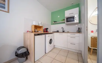 Cuisine ou kitchenette dans l'établissement Calme en plein cœur du quartier historique