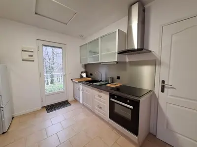Cuisine ou kitchenette dans l'établissement Escapade au Lac