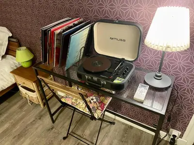 Télévision ou salle de divertissement dans l'établissement Gite la Maison du Tonnelier