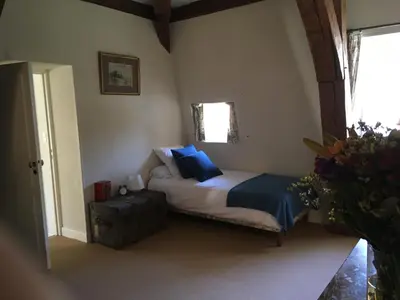 Un ou plusieurs lits dans un hébergement de l'établissement Maison d'Hôtes Chandon de Briailles