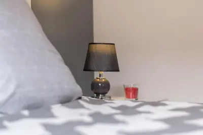 Un ou plusieurs lits dans un hébergement de l'établissement Sweet Home Dijon Nodot